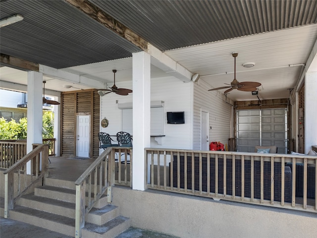 view of exterior entry with ceiling fan