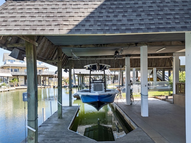 view of dock with a water view