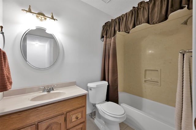 full bathroom featuring shower / bath combo with shower curtain, vanity, a textured ceiling, toilet, and tile patterned floors