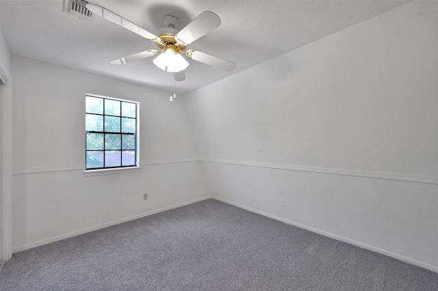 carpeted empty room with ceiling fan