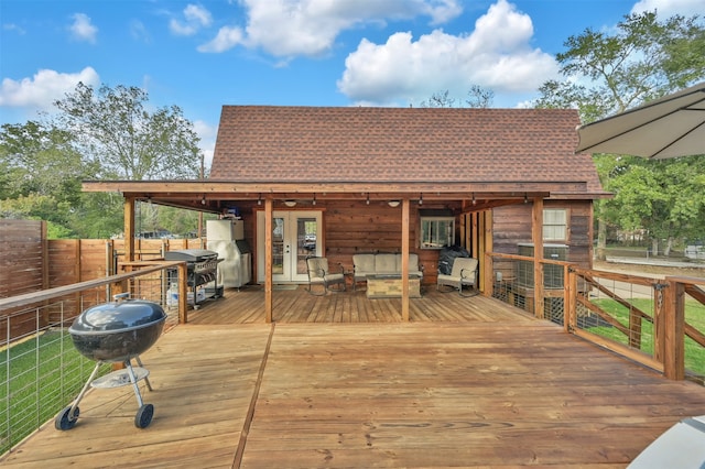 wooden deck featuring grilling area