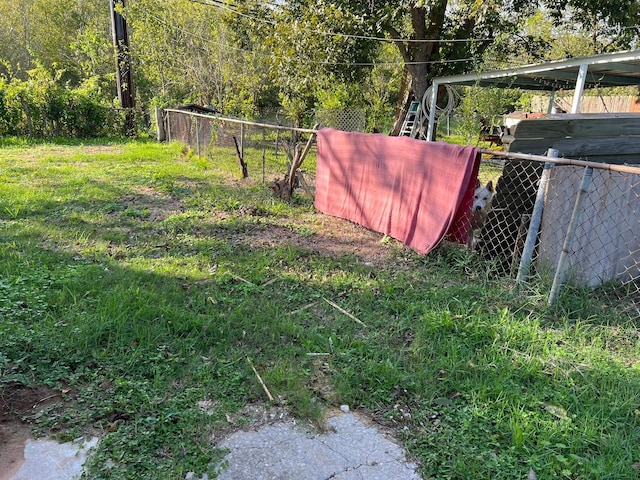 view of yard featuring fence