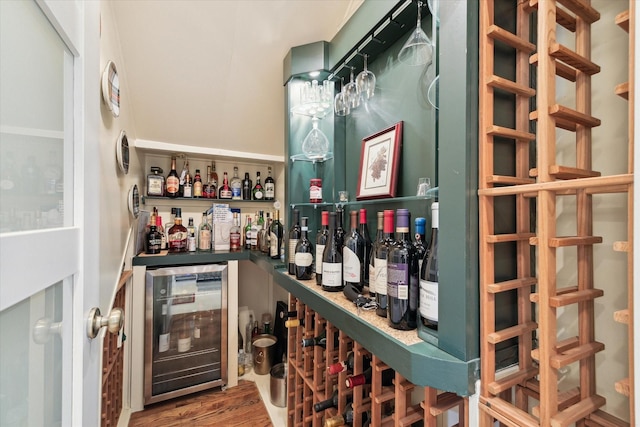 wine room with bar and beverage cooler