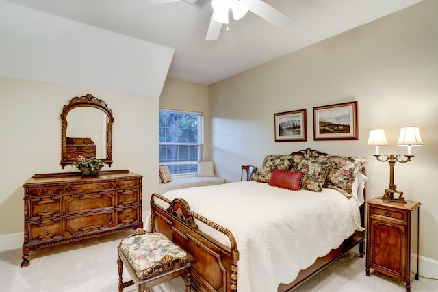 bedroom featuring ceiling fan and light carpet