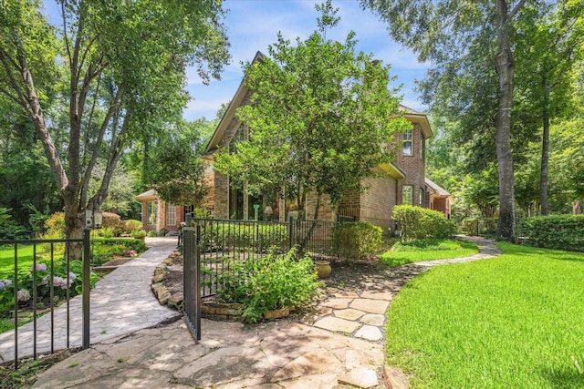 exterior space featuring a front yard