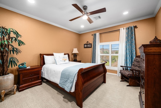 bedroom featuring ceiling fan, light colored carpet, and ornamental molding