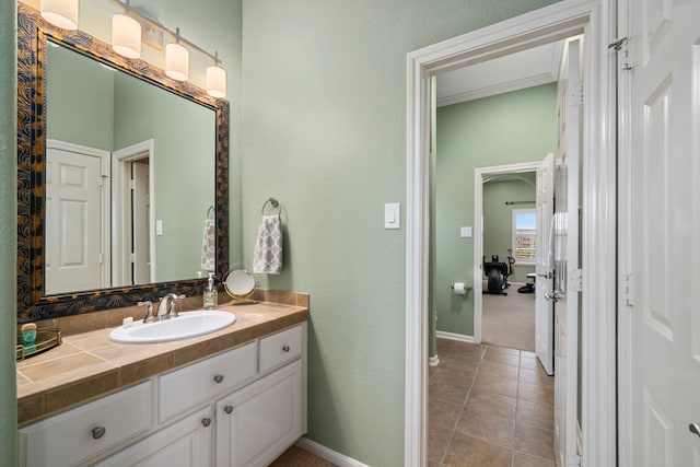 bathroom featuring tile patterned floors and vanity