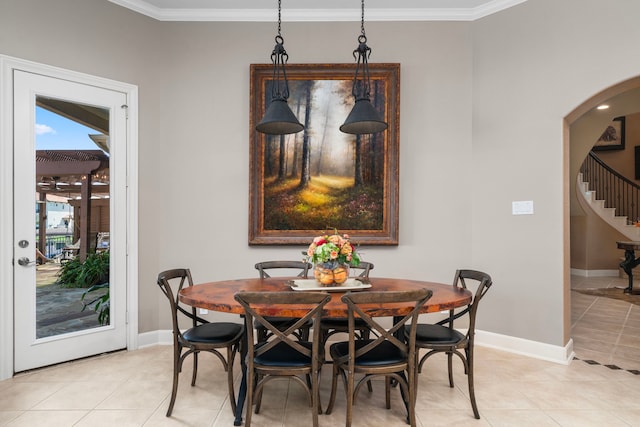 tiled dining space with crown molding