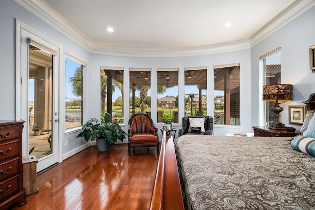 bedroom with access to outside, ornamental molding, and dark hardwood / wood-style floors