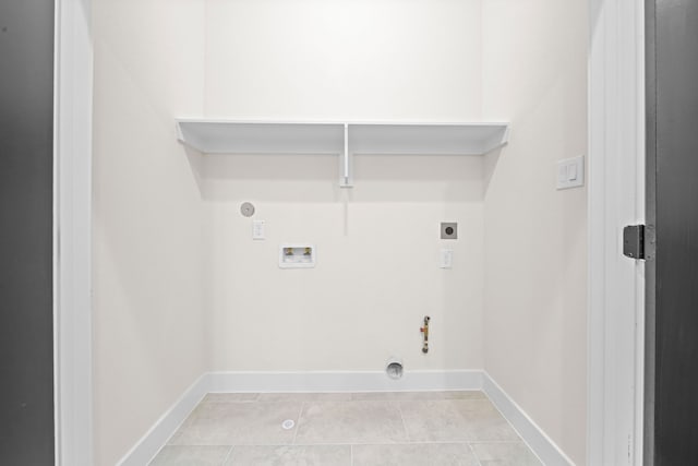 laundry room featuring washer hookup, light tile patterned floors, hookup for a gas dryer, and hookup for an electric dryer