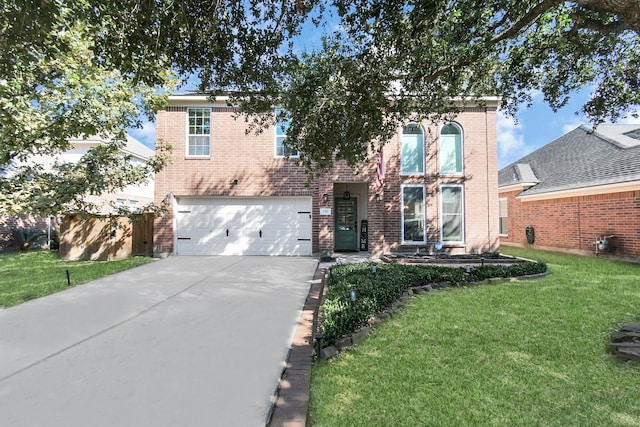 view of front facade featuring a garage and a front lawn