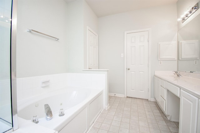 bathroom featuring a bath and vanity