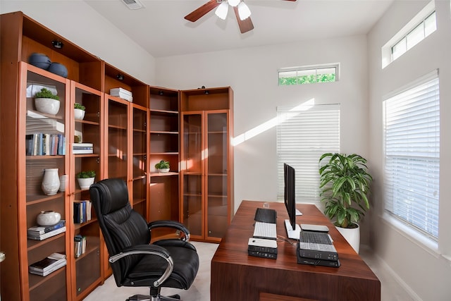 office with ceiling fan and a healthy amount of sunlight