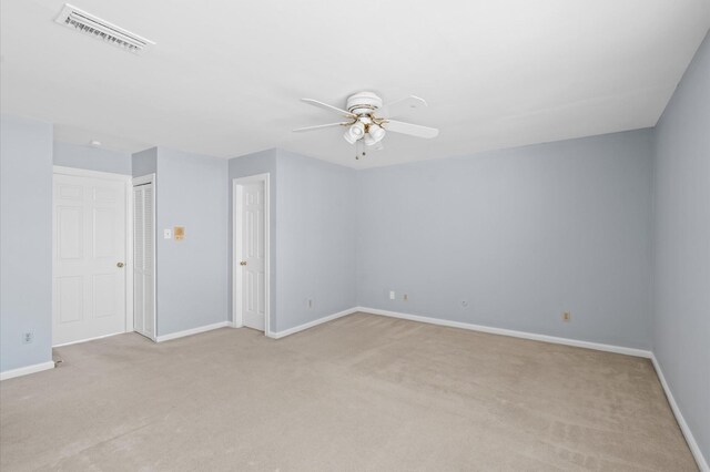 600 Wilcrest Dr Unit 8, Houston, TX 77042 - unfurnished room featuring light colored carpet, ceiling fan, and baseboards