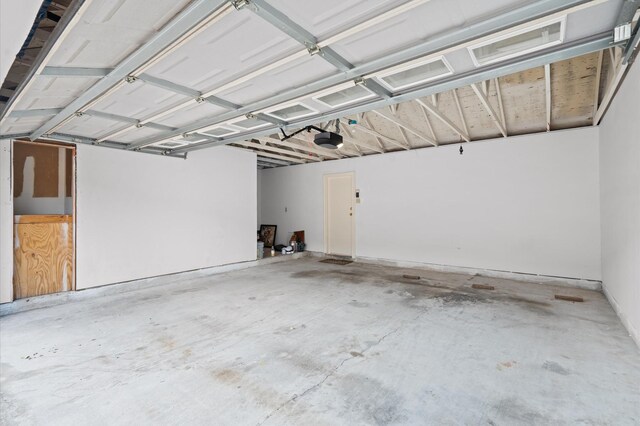 600 Wilcrest Dr Unit 8, Houston, TX 77042 - garage with a garage door opener