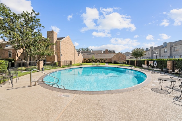 view of pool with a patio area