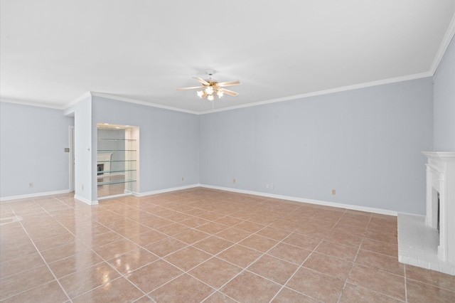 600 Wilcrest Dr Unit 8, Houston, TX 77042 - unfurnished living room with a ceiling fan, crown molding, light tile patterned flooring, a fireplace with raised hearth, and baseboards