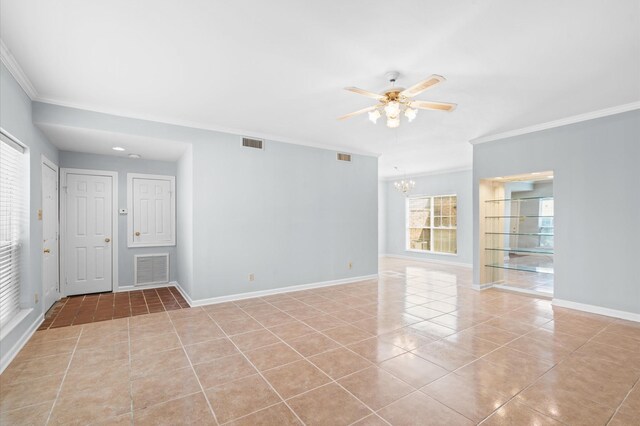 600 Wilcrest Dr Unit 8, Houston, TX 77042 - unfurnished room featuring crown molding, light tile patterned flooring, a chandelier, ceiling fan, and baseboards
