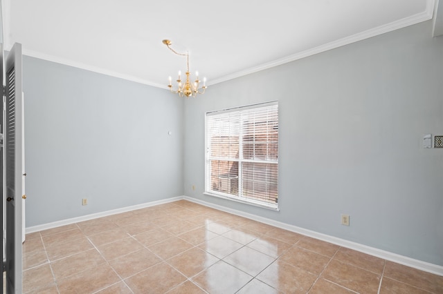 tiled spare room featuring an inviting chandelier and ornamental molding