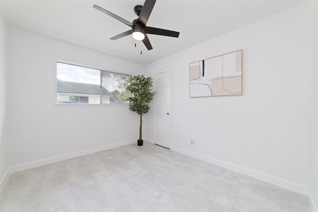 empty room featuring ceiling fan