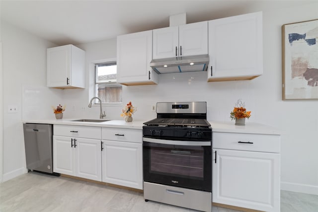 kitchen with stainless steel appliances, sink, and white cabinetry