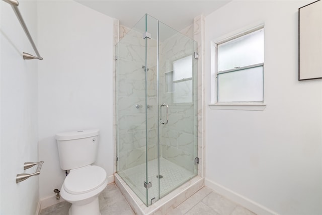 bathroom featuring walk in shower, toilet, and tile patterned floors