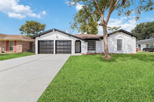 ranch-style house with a front yard and a garage