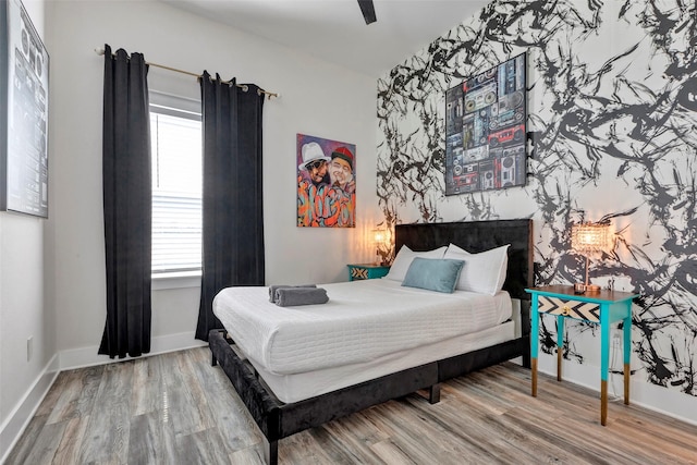 508 E 31st St, Houston, TX 77018 - bedroom featuring wood finished floors and baseboards