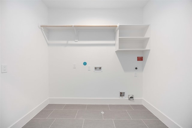 laundry room with tile patterned flooring, gas dryer hookup, hookup for a washing machine, and electric dryer hookup