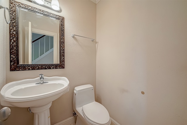 bathroom featuring toilet