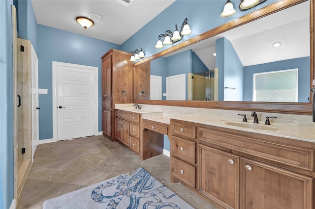 bathroom featuring vanity, lofted ceiling, and an enclosed shower