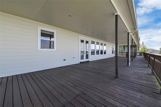 wooden terrace featuring french doors