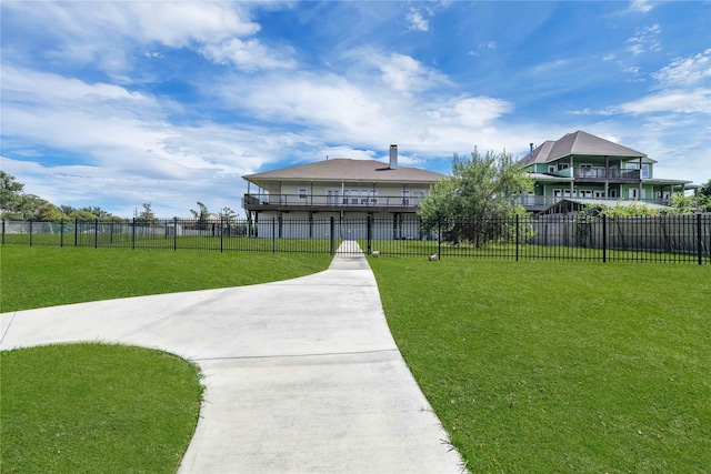 view of community with a lawn