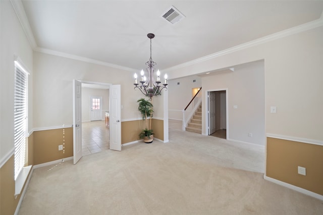 unfurnished room with ornamental molding, a chandelier, and light colored carpet