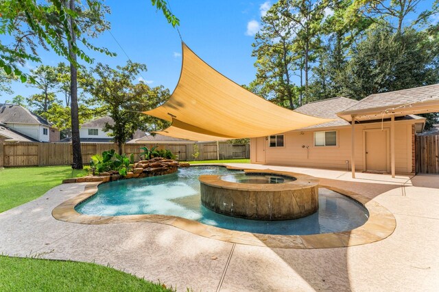 view of swimming pool with an in ground hot tub and a patio