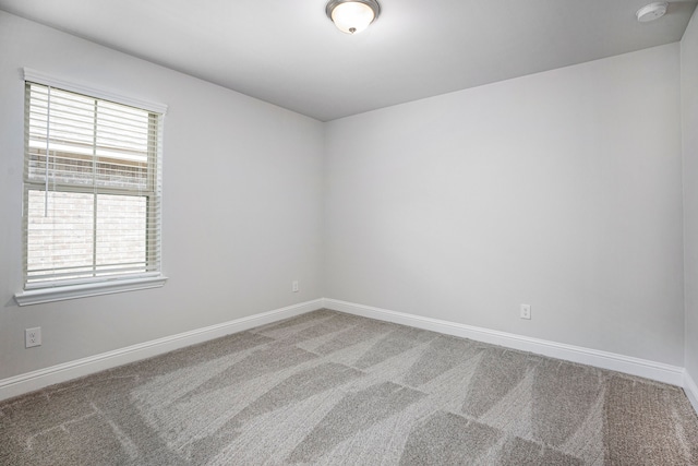 spare room featuring carpet flooring