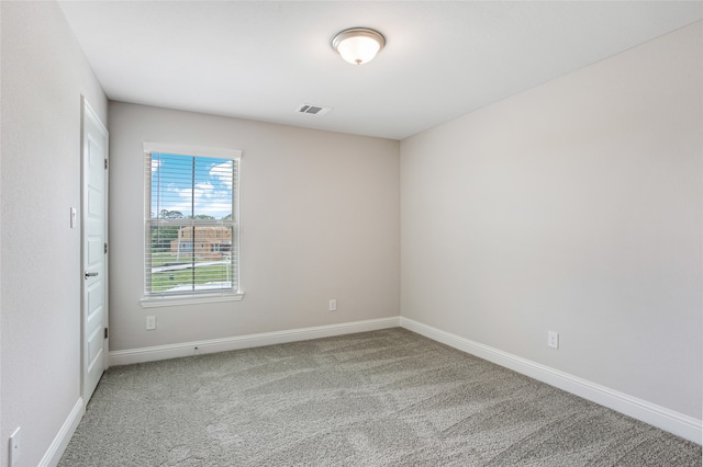 spare room with carpet flooring