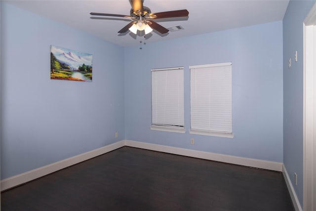 19523 Riverwalk Dr, Porter, TX 77365 - unfurnished room with a ceiling fan, baseboards, and dark wood finished floors