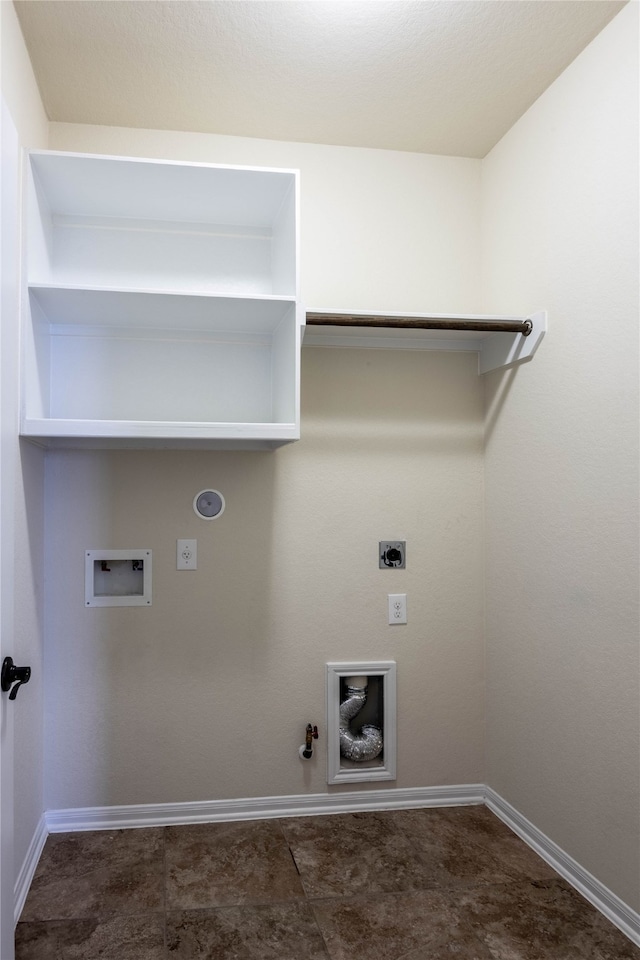 clothes washing area featuring hookup for a washing machine, gas dryer hookup, and hookup for an electric dryer