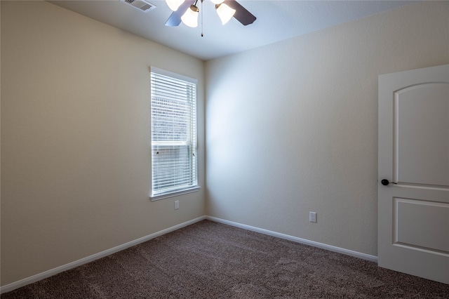 spare room with carpet and ceiling fan