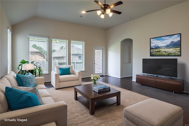 living room featuring wood-type flooring, lofted ceiling, and ceiling fan