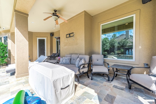 view of patio featuring ceiling fan and an outdoor hangout area