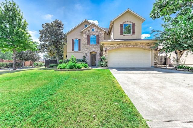 view of front of house with a garage and a front lawn