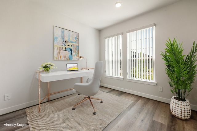 office area with hardwood / wood-style floors