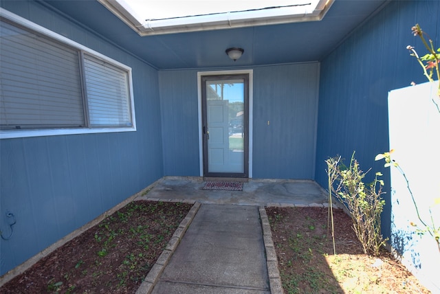 doorway to property featuring a patio