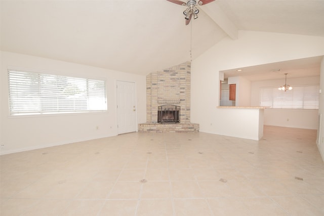 unfurnished living room with beamed ceiling, ceiling fan with notable chandelier, a brick fireplace, light tile patterned floors, and high vaulted ceiling