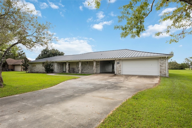 single story home featuring a garage and a front yard