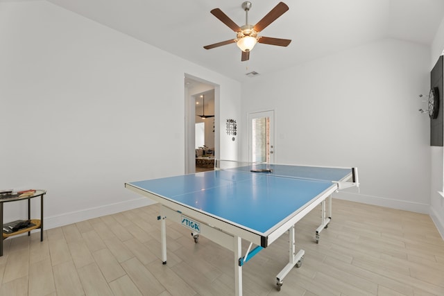 recreation room with light hardwood / wood-style floors, lofted ceiling, and ceiling fan