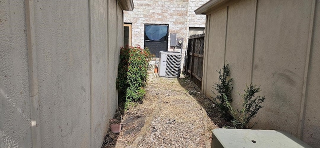 view of property exterior with cooling unit