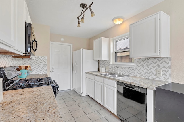 kitchen with black appliances, backsplash, sink, and white cabinets